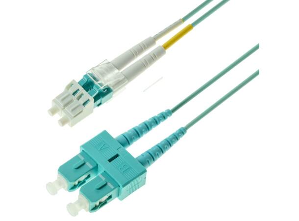Snor MM DPX LC/PC-SC/PC 30 m 50/OM3 BIF 2x ø2mm Aqua 